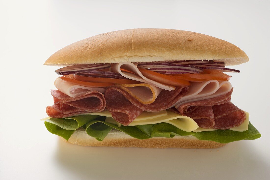 Salami, ham, cheese and salad sandwich