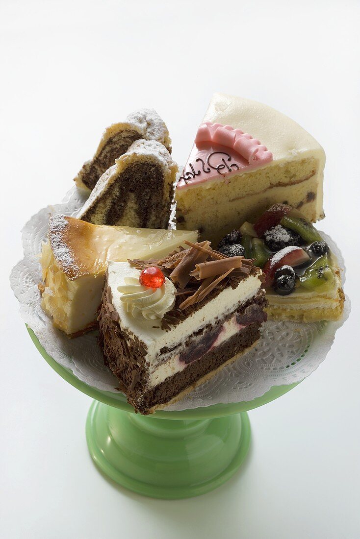 A selection of pieces of cake on cake stand