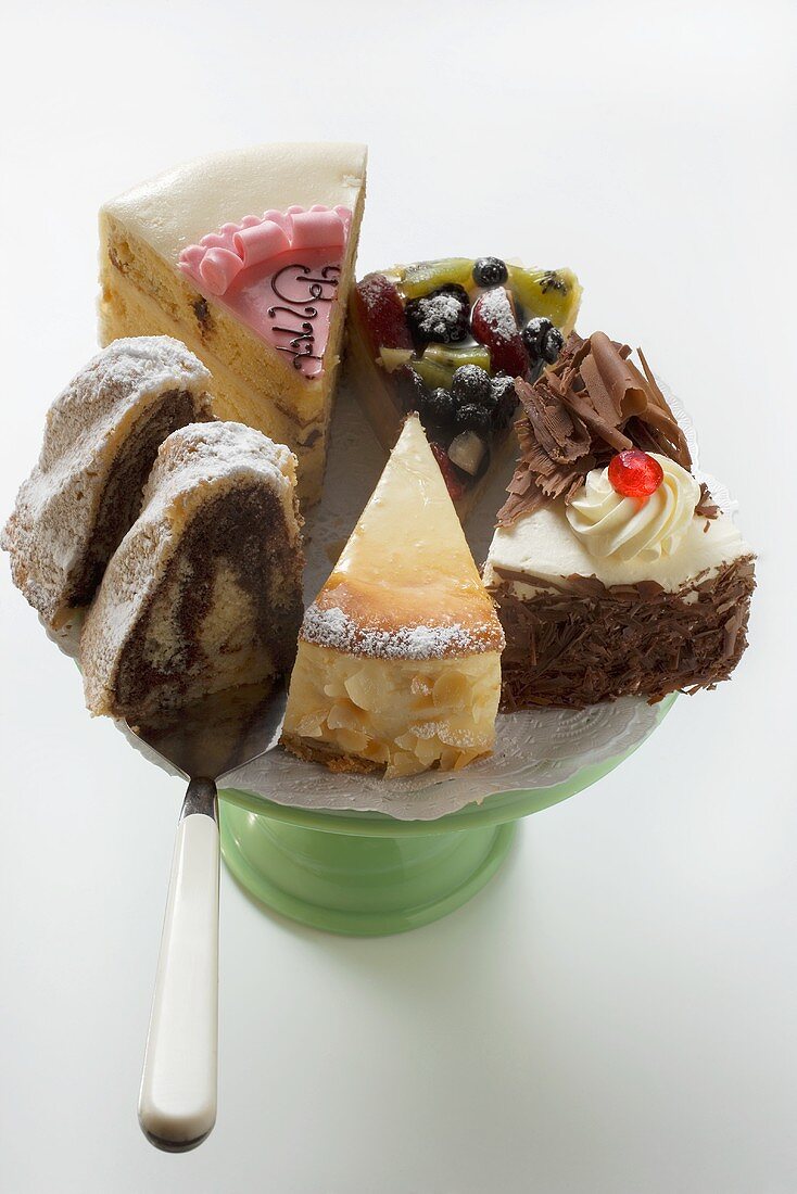 A selection of pieces of cake on cake stand