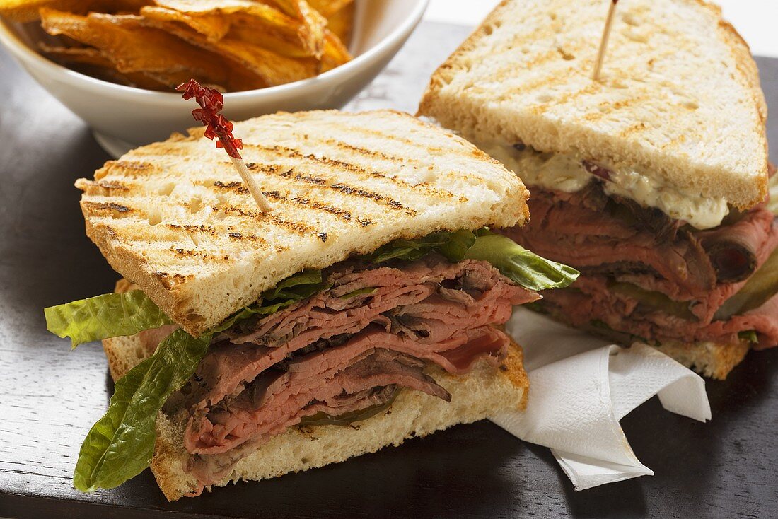 Roast beef sandwiches, crisps