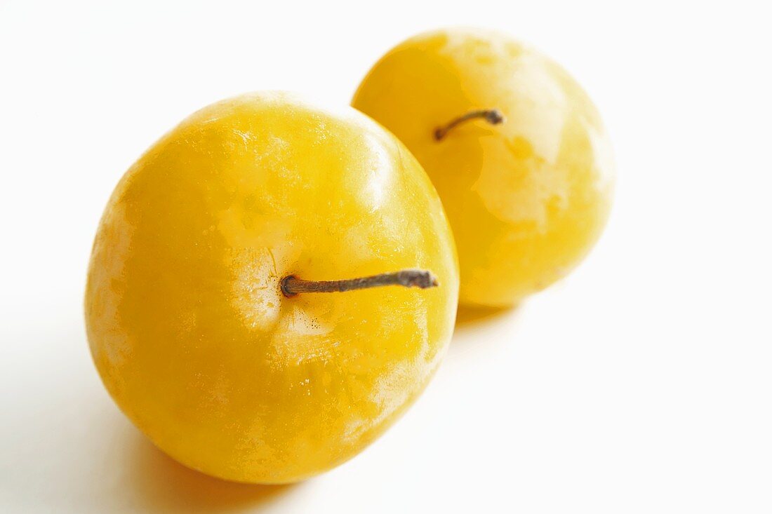Two yellow plums