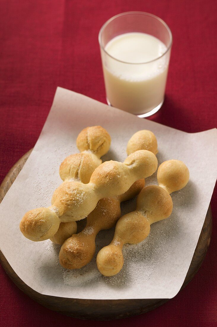 Small bread rolls from Liguria (Michetta) and glass of milk