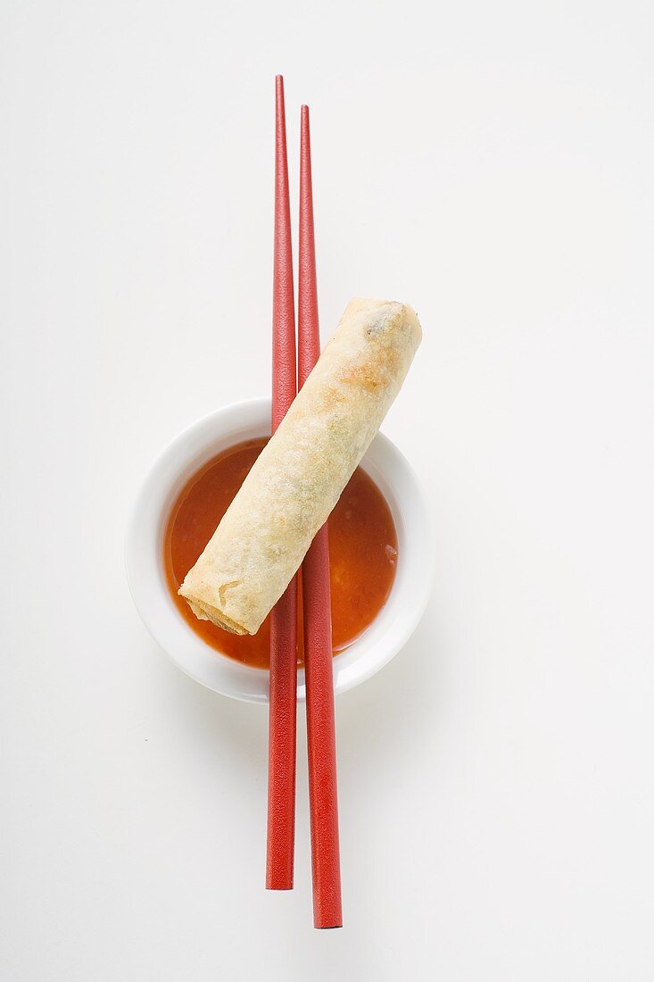 Spring roll on sweet and sour sauce