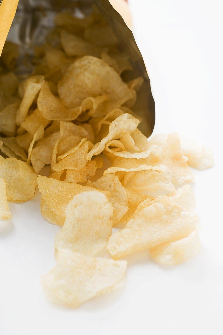 Potato crisps in opened bag