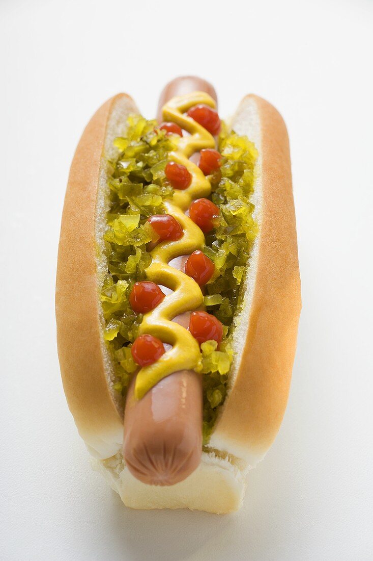 Hot dog with relish, mustard and ketchup