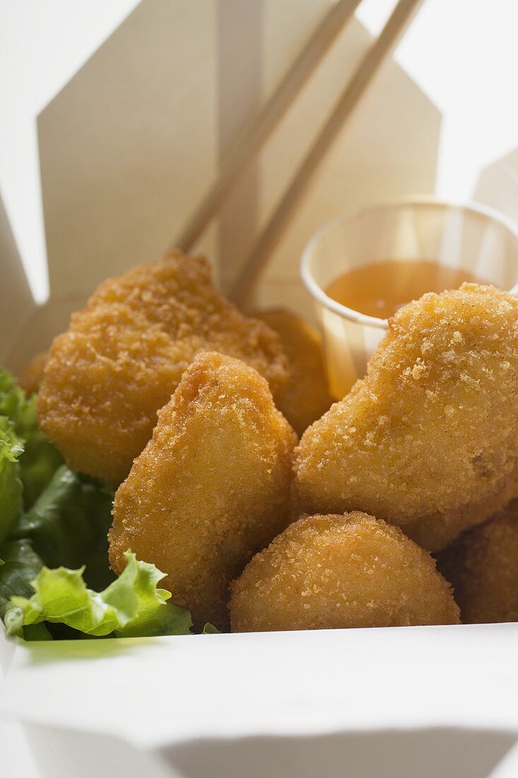 Chicken Nuggets mit süsssaurer Sauce zum Mitnehmen