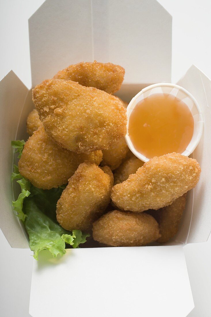 Chicken Nuggets with sweet and sour sauce to take away
