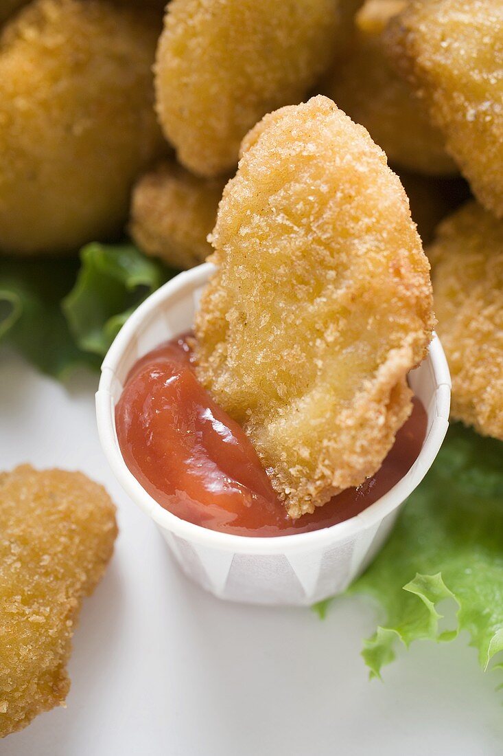 Dipping Chicken Nugget into ketchup