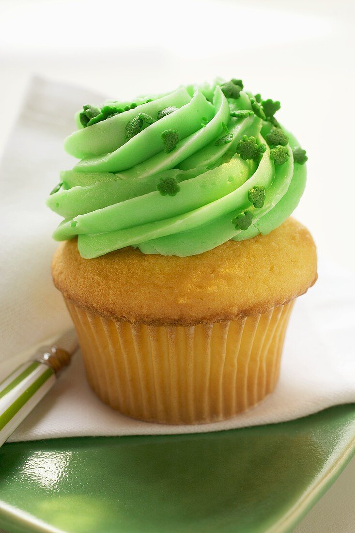 Muffin with green cream for St. Patrick's Day