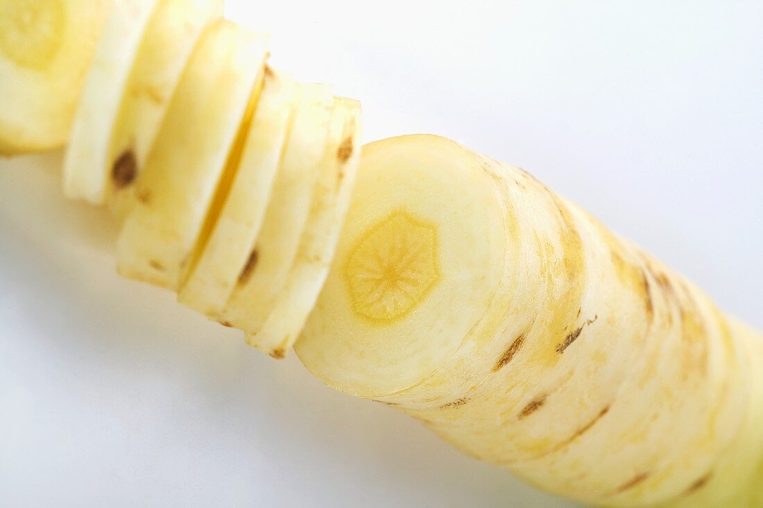 Yellow carrot, partly sliced