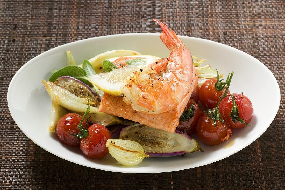 Shrimp on salmon fillet with vegetables