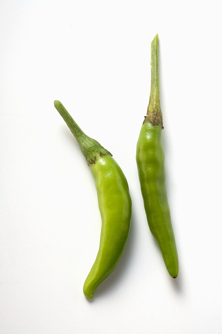 Two green chili peppers