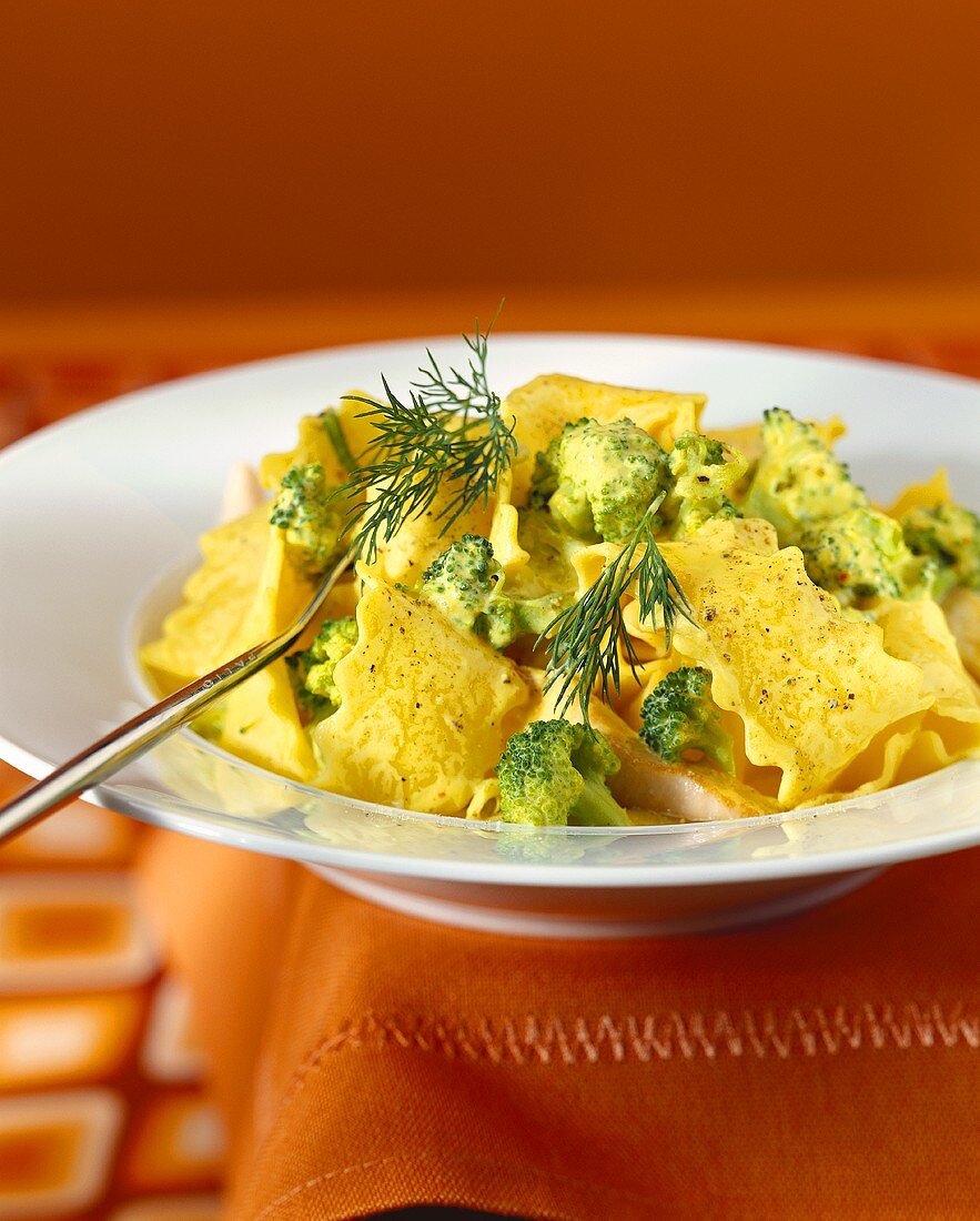 Home-made noodles with broccoli, fish & saffron sauce