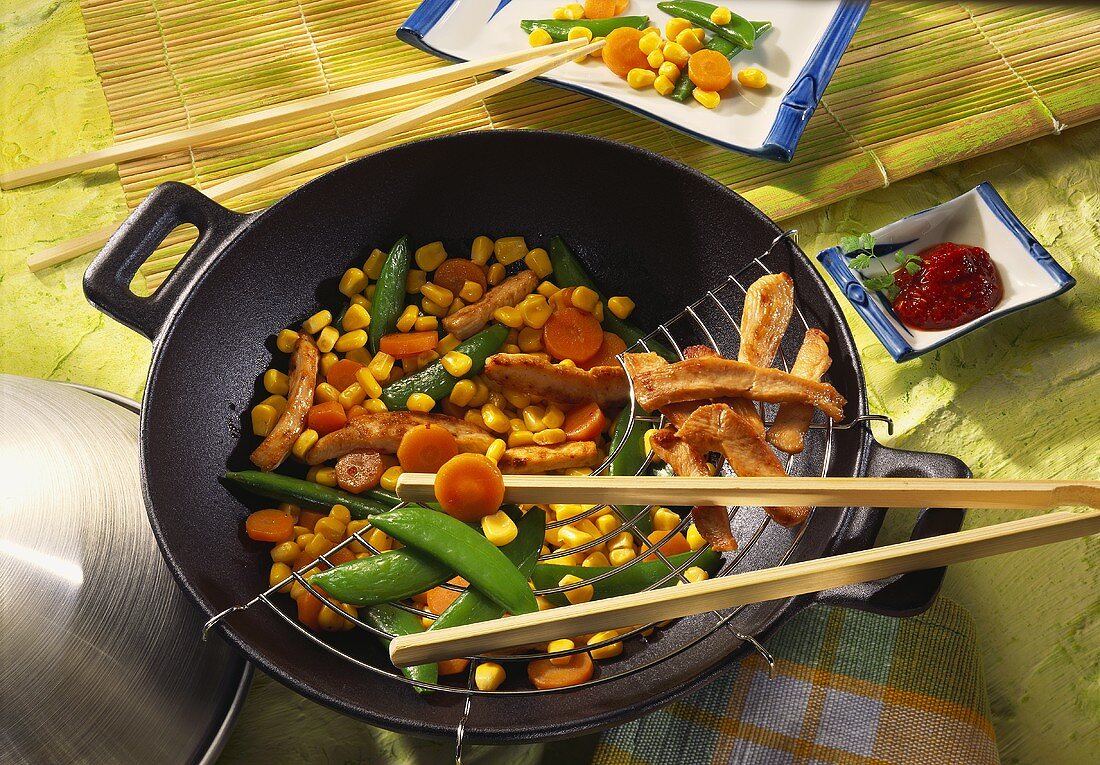 Meat and vegetables in wok