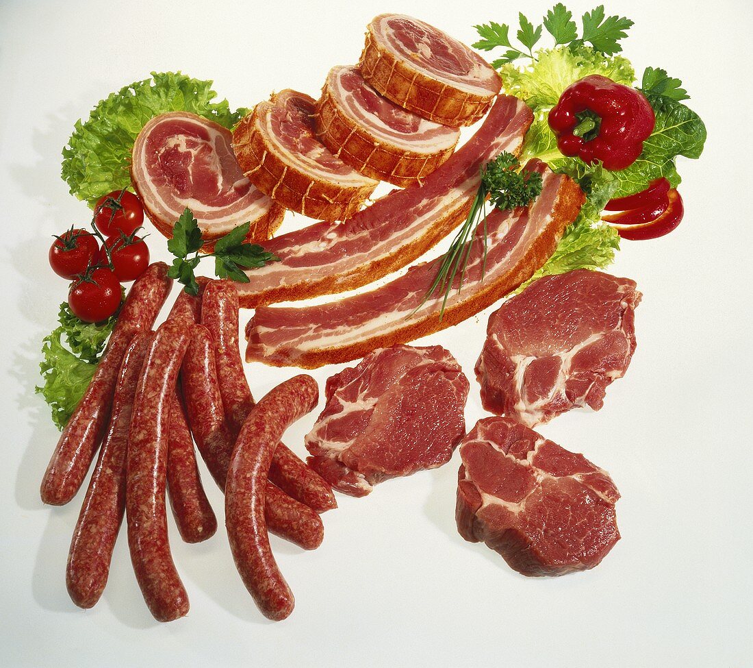 Raw pork roll, belly pork, sausages and neck cut