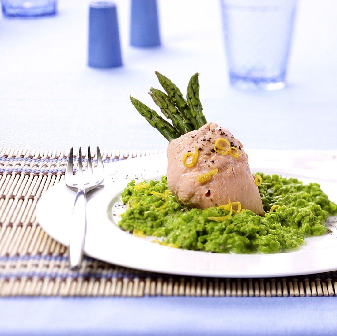 Steamed salmon trout with green asparagus and pea puree
