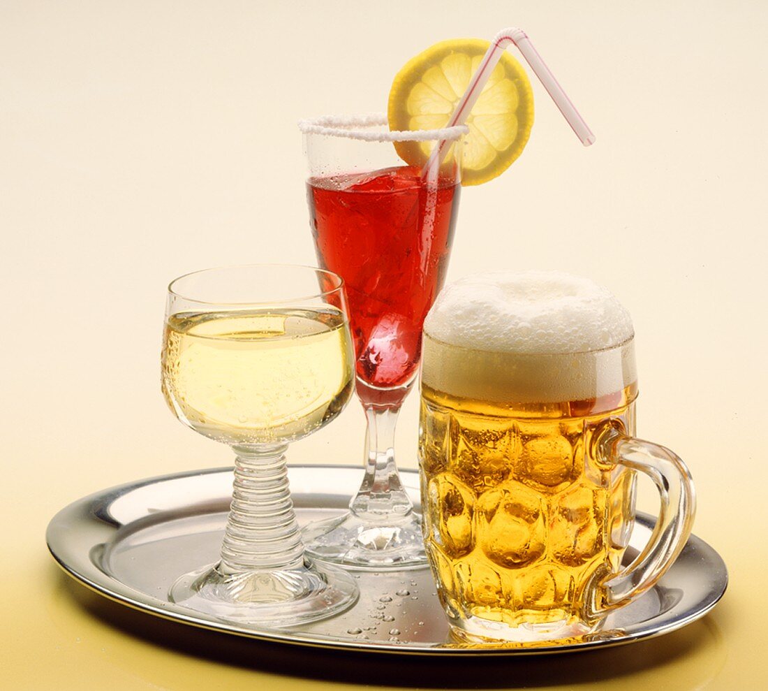 Tray with light beer, white wine and cocktail