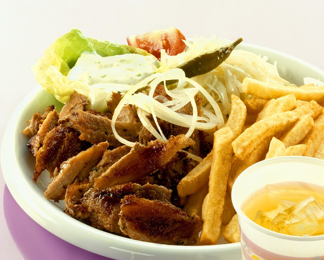 Gyros with chips, tzatziki and cabbage salad