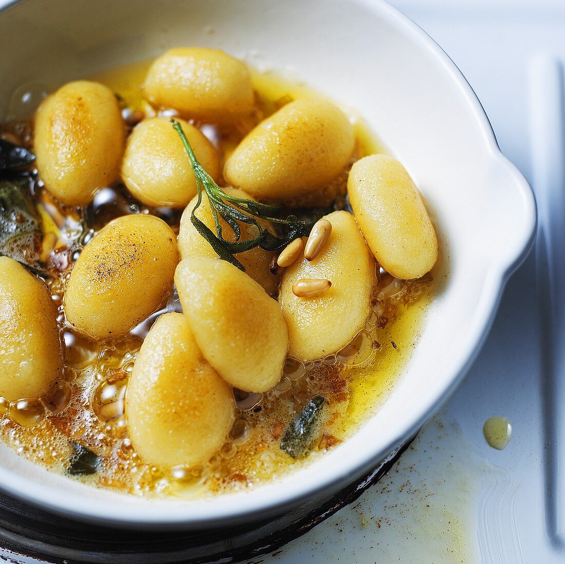 Gnocchi in sage butter with pine nuts