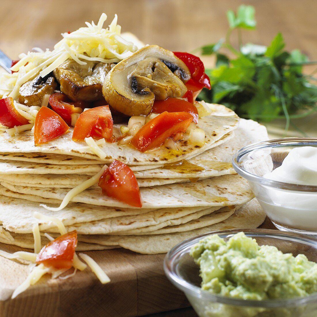 Fajitas with tomatoes, Portobello mushrooms & grated cheese