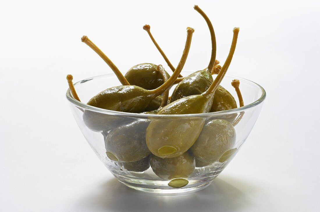 Giant capers in a glass bowl