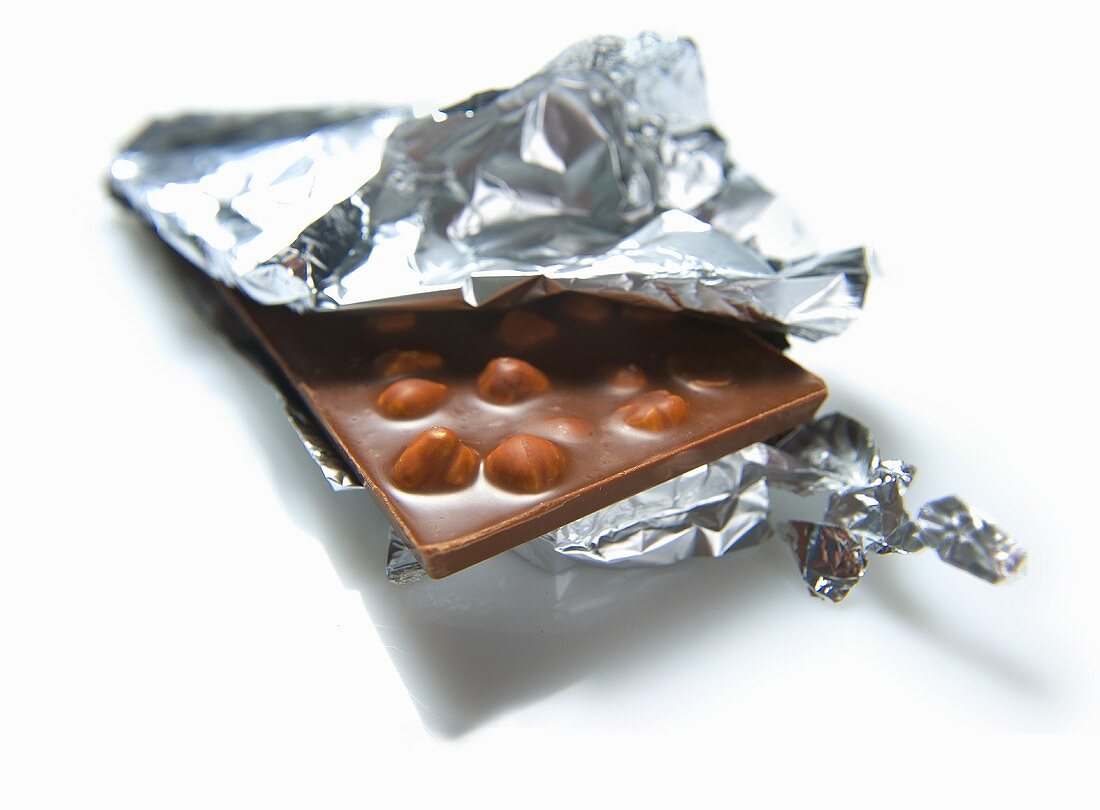 An opened bar of nut chocolate