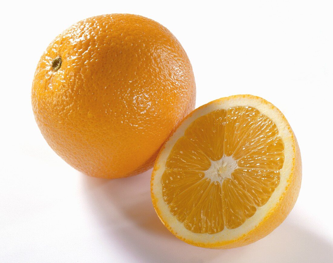 One half and one whole orange