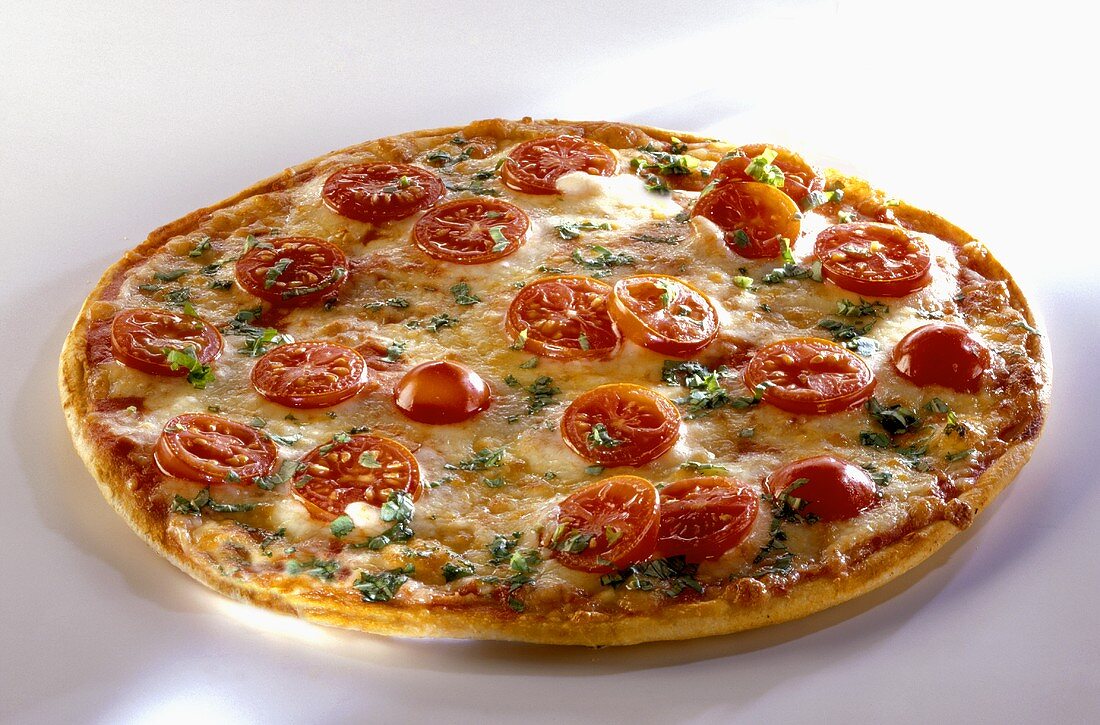 Pizza with tomato slices