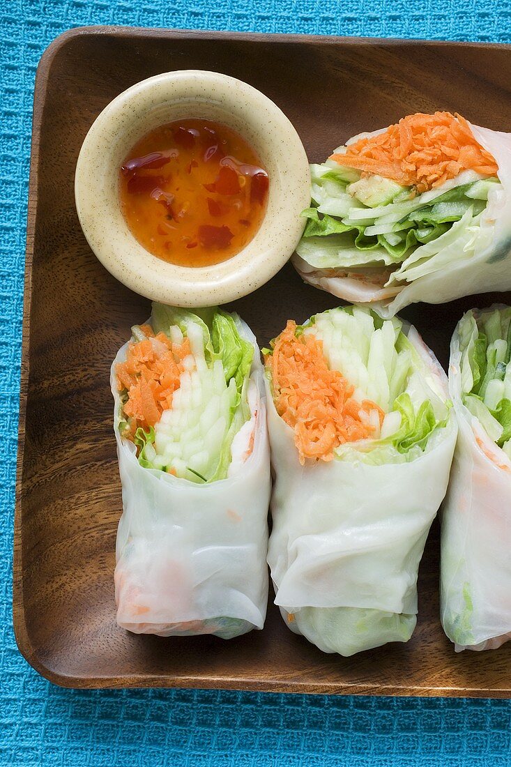 Vietnamese rice paper rolls with vegetable filling and dip