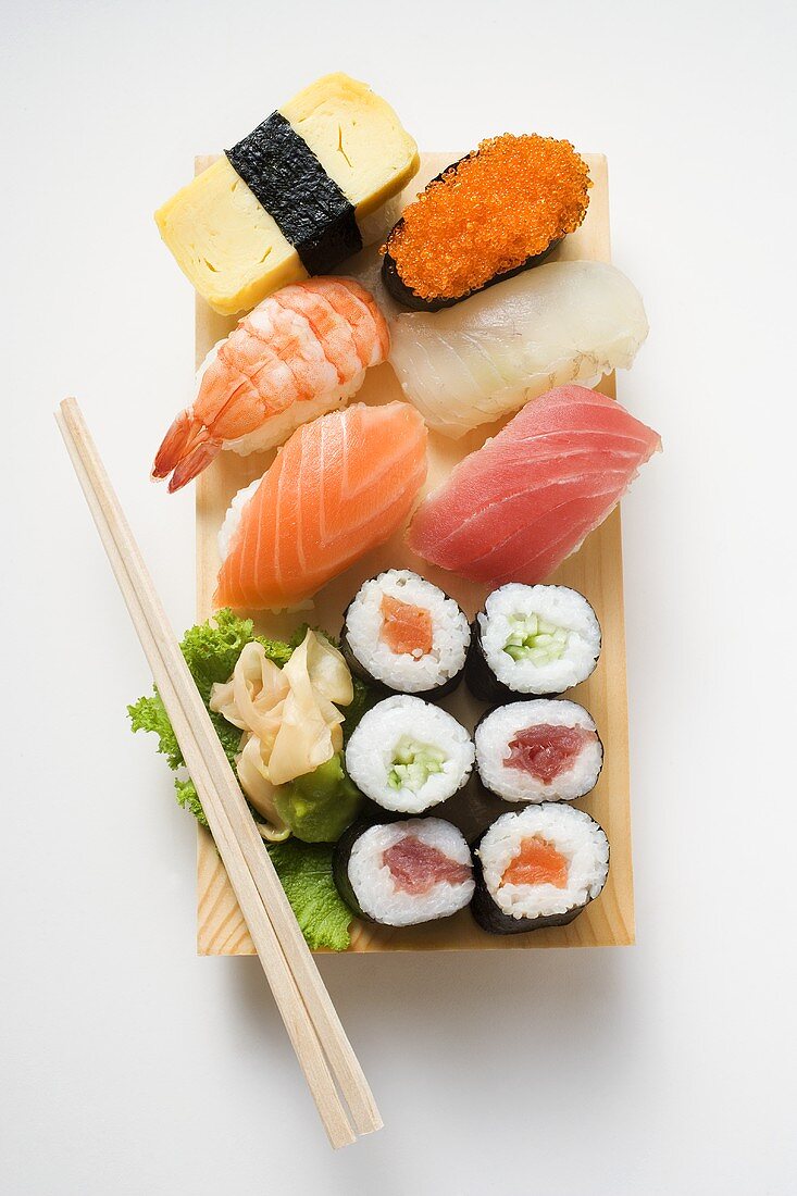 Assorted sushi on sushi board