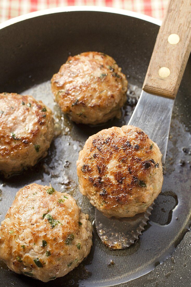 Burgers in a frying pan