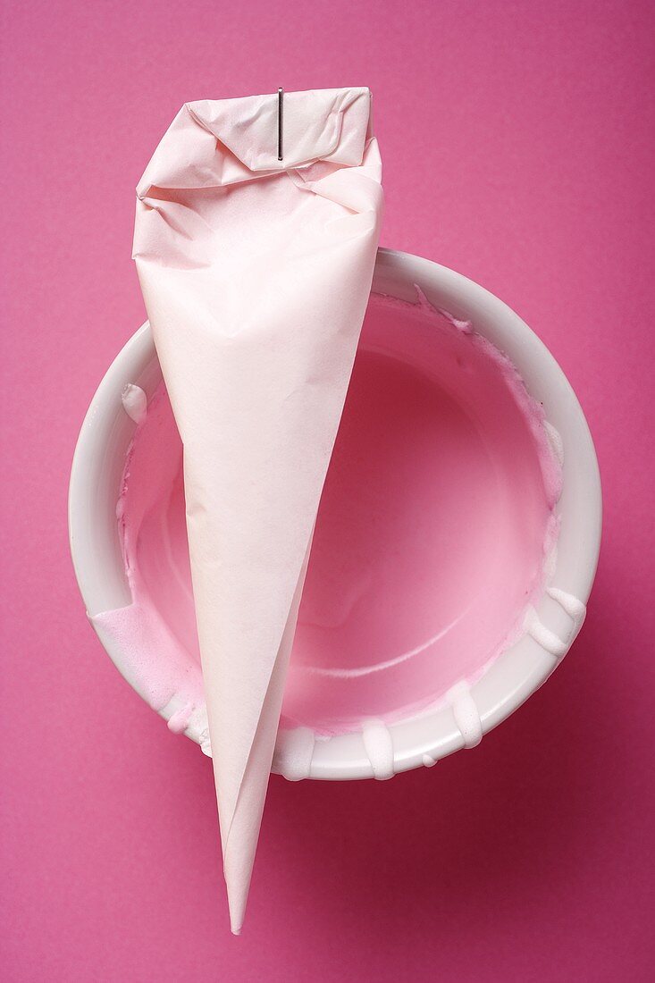 Piping bag with pink icing
