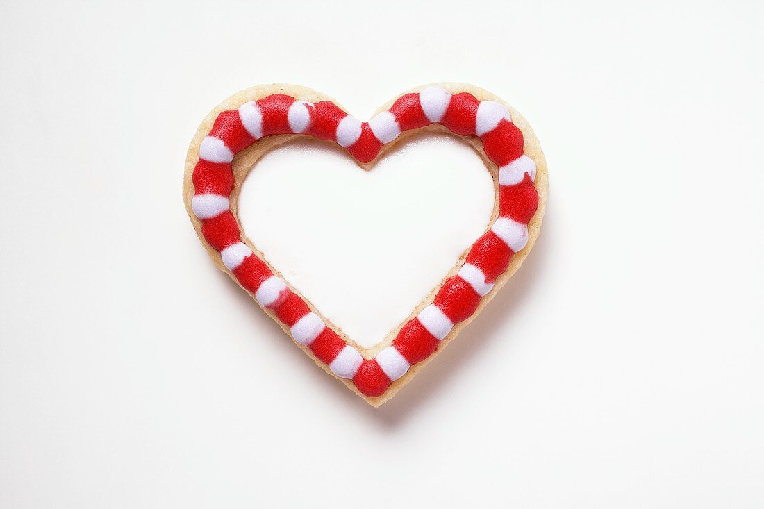 Biscuit heart with red and white decoration