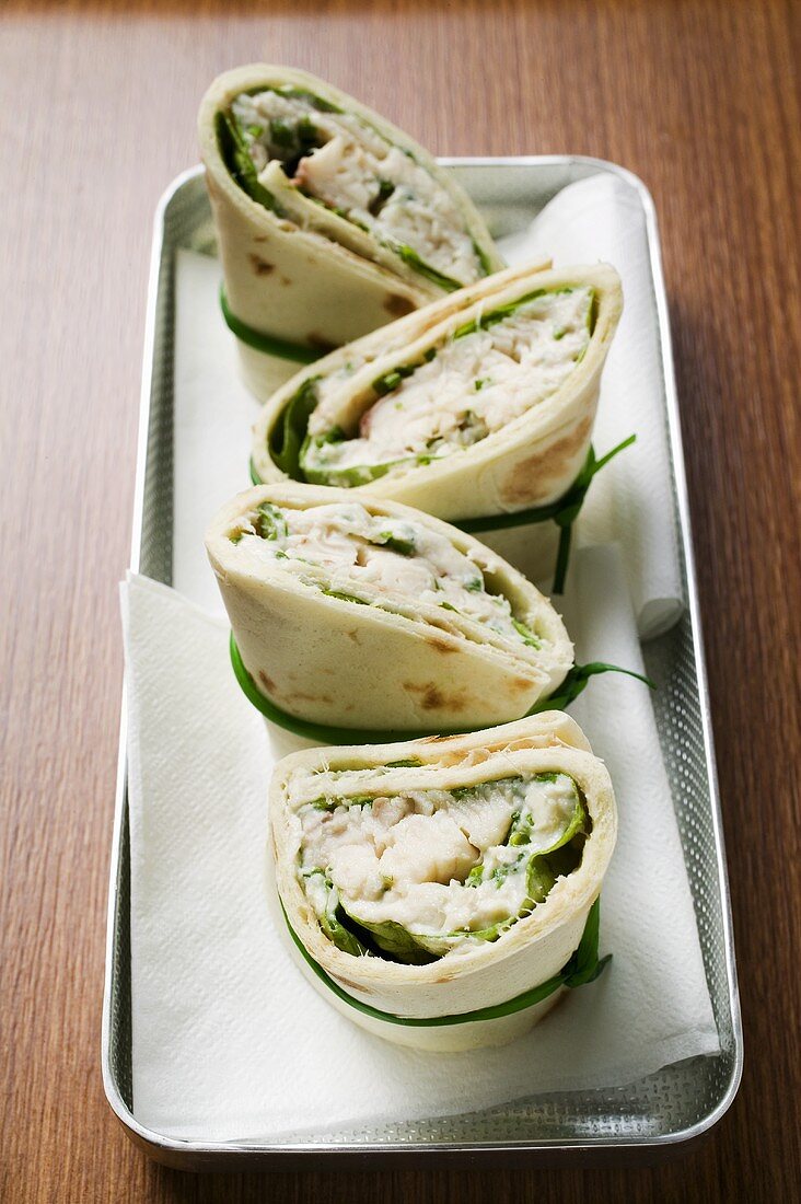 Four wraps with fish filling