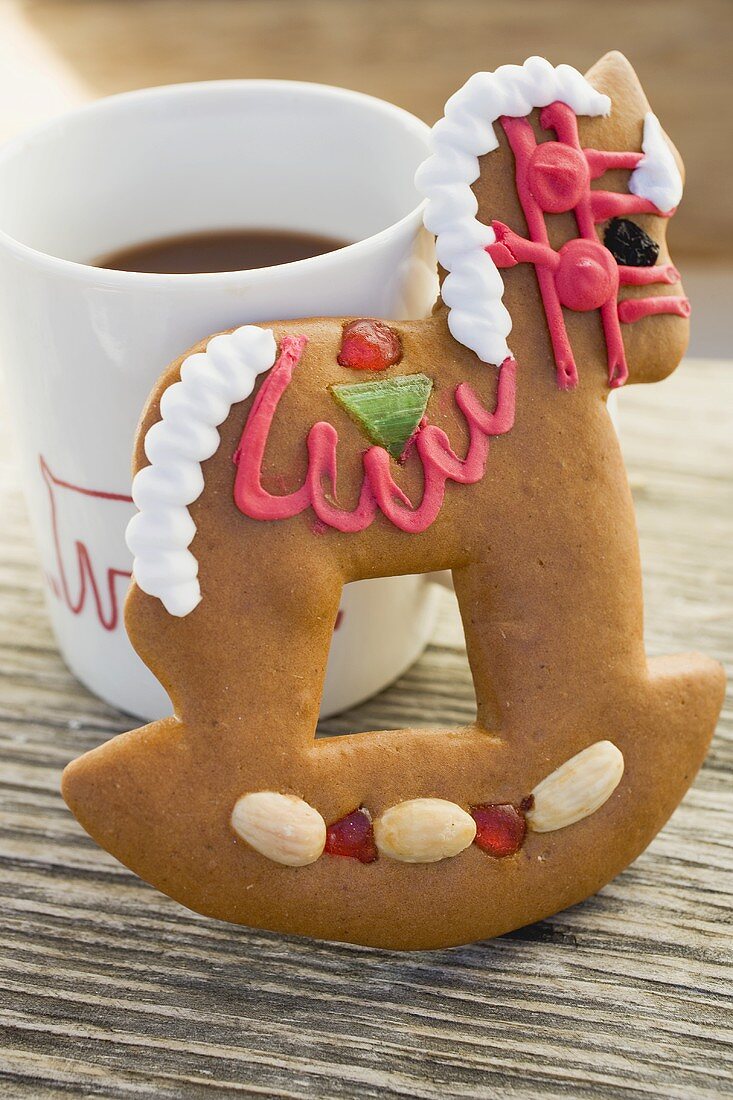 Gingerbread rocking horse and mug of cocoa