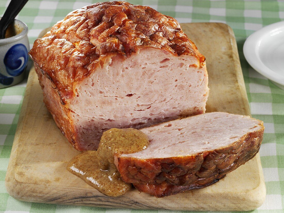 Leberkäse (a type of meatloaf) with sweet mustard