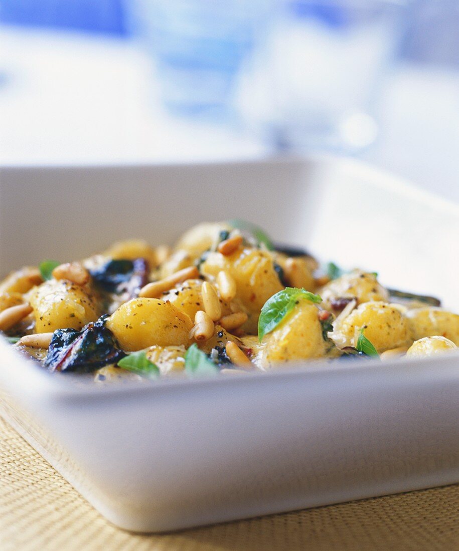 New potato salad with pine nuts and basil