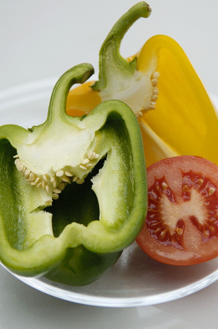 Halved peppers and tomato