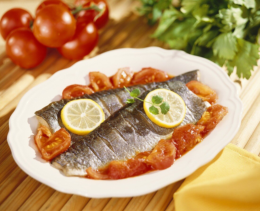 Steamed trout with tomatoes