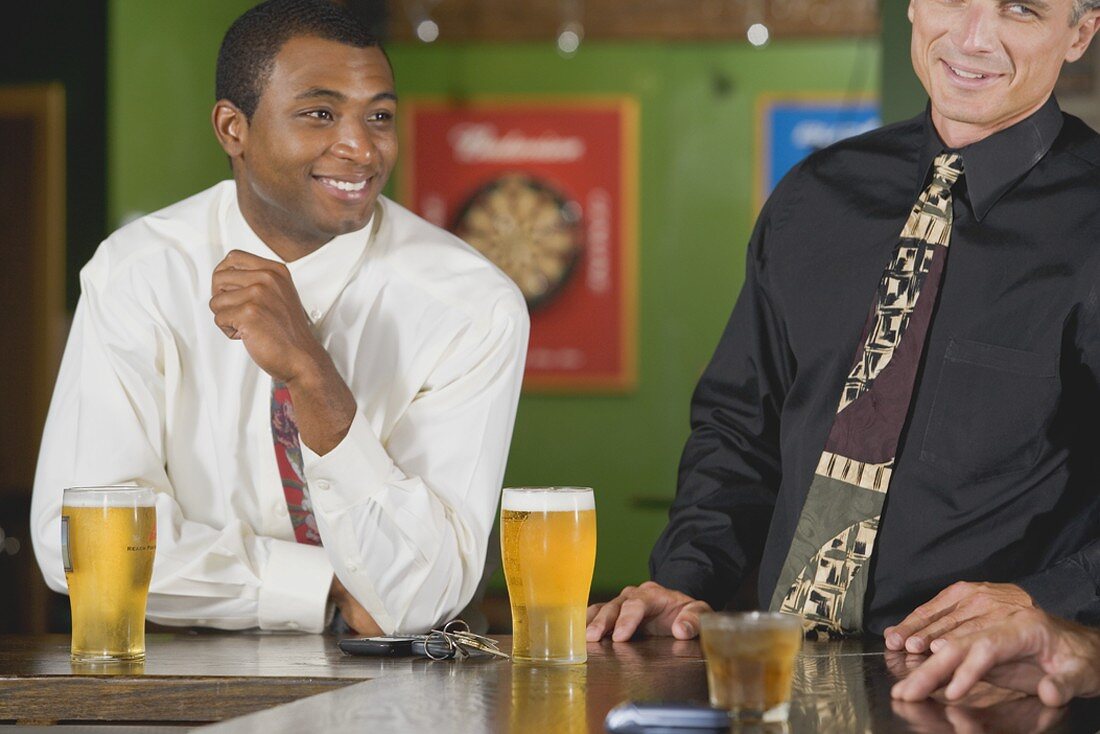 Men at the bar in a pub