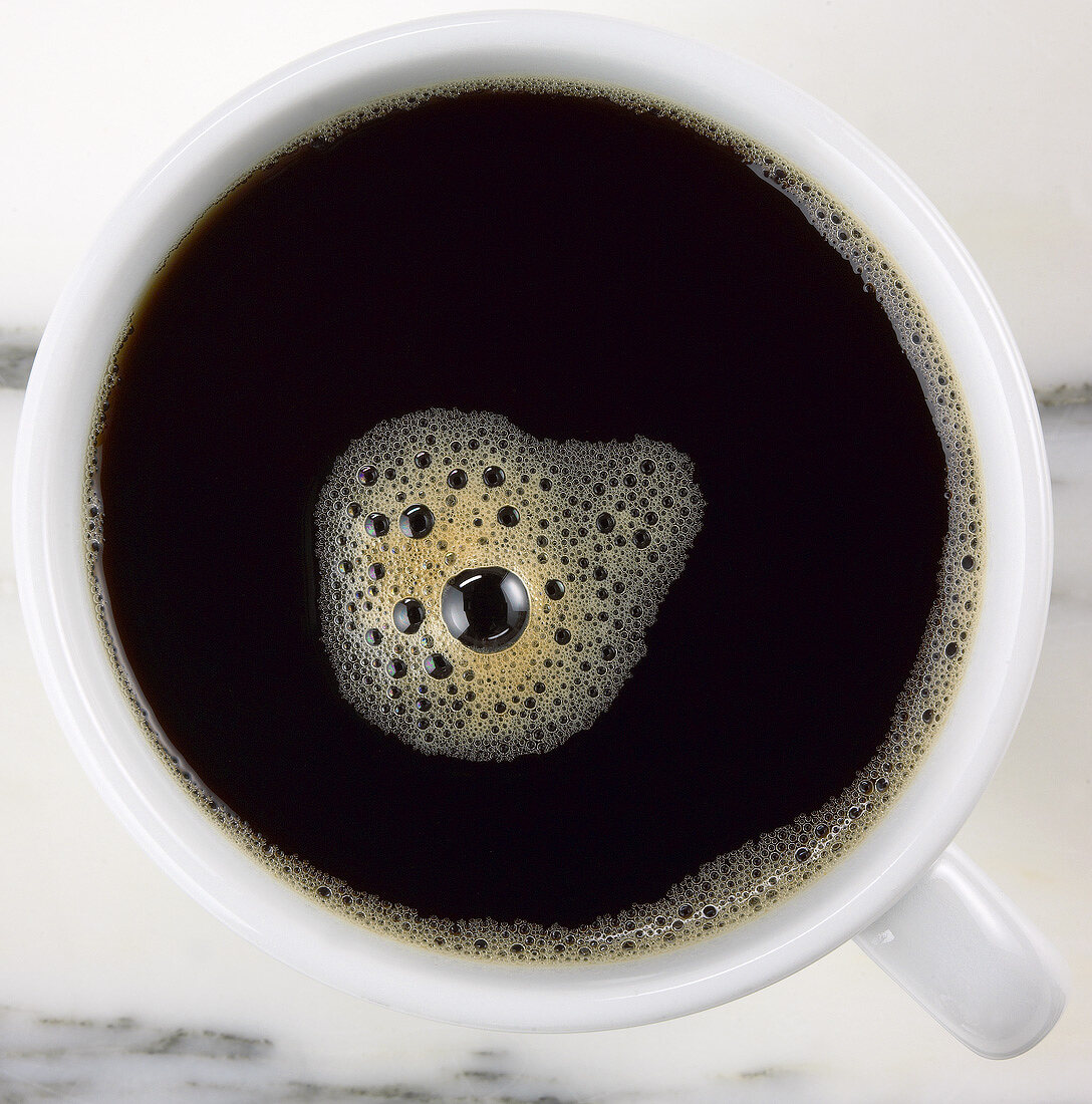 A cup of black coffee (from above)