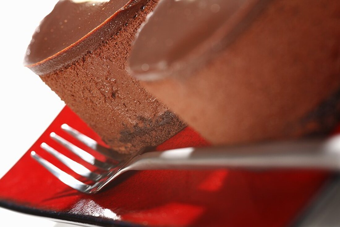 Two chocolate cakes with fork