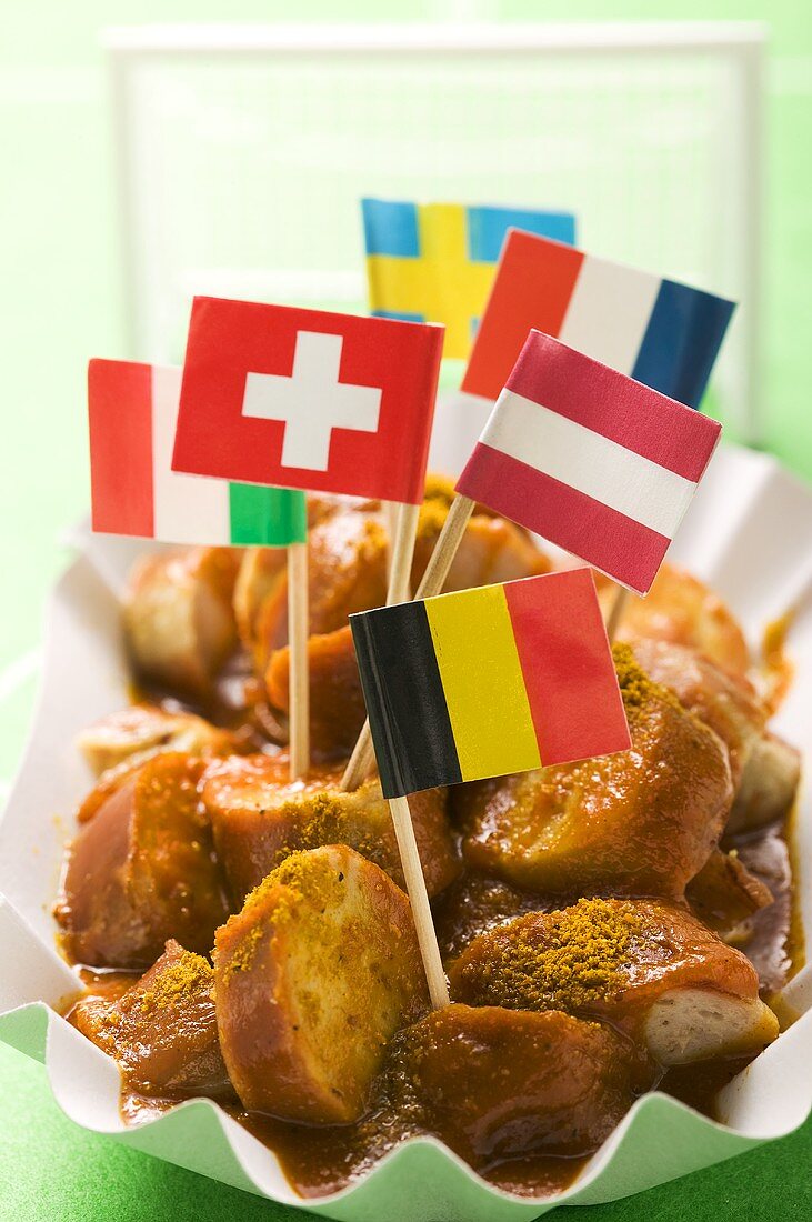 Currywurst (sausage with curry sauce) with European flags