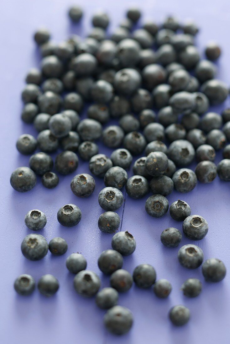 Blueberries on blue background