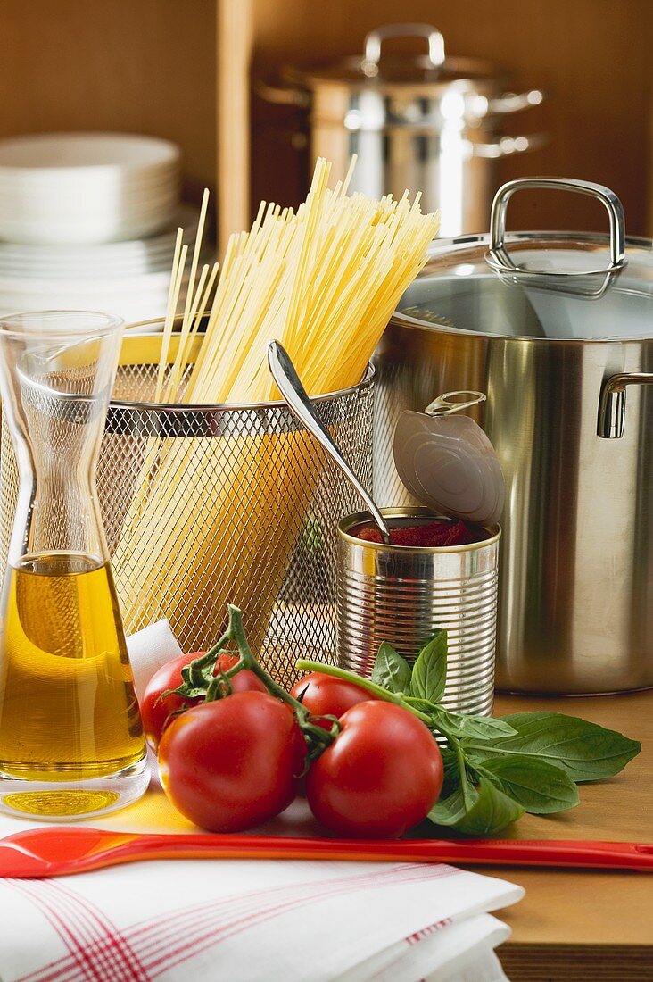 Ingredients for spaghetti with tomato sauce and basil