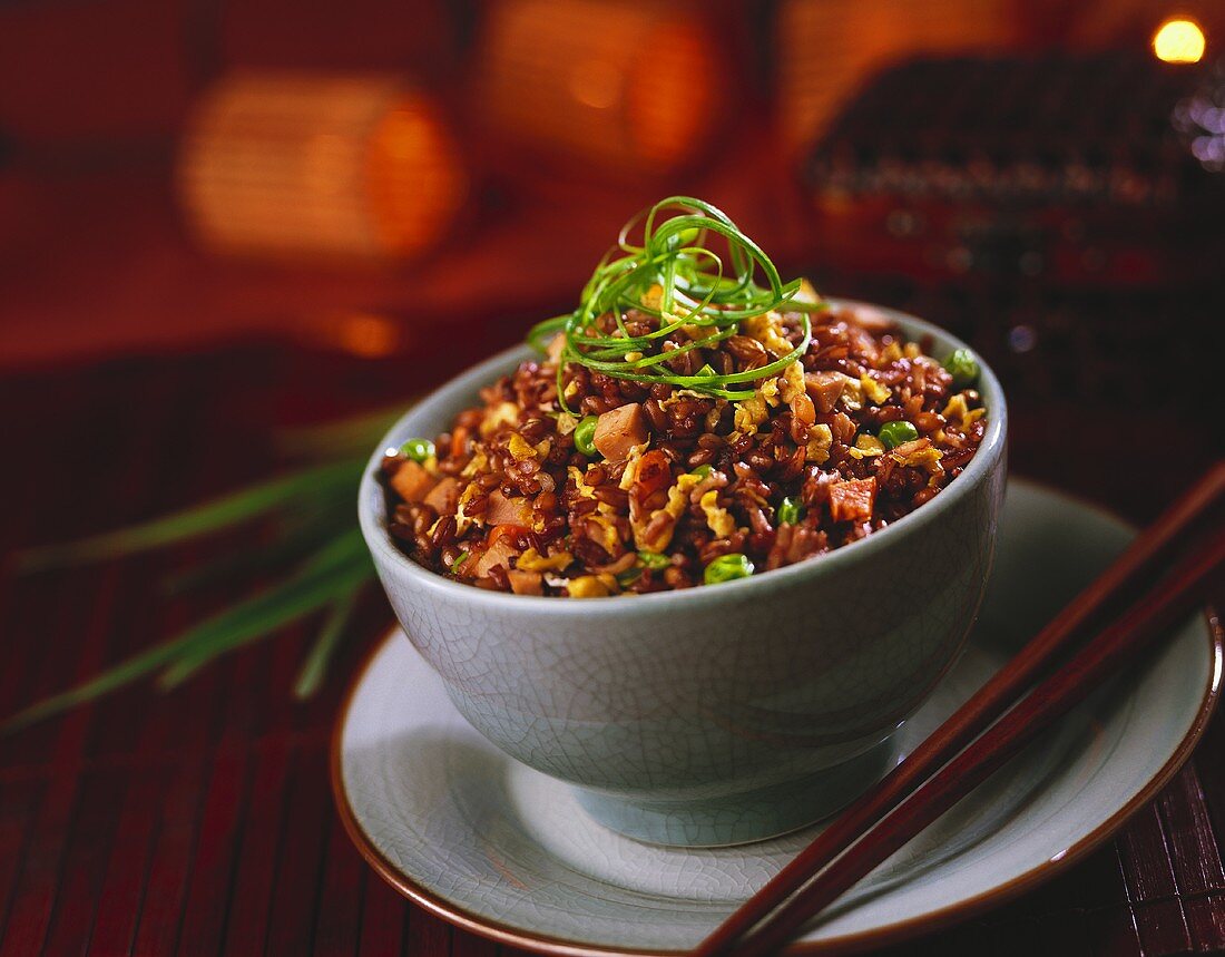 Bowl of Asian Fried Rice with Chopsticks