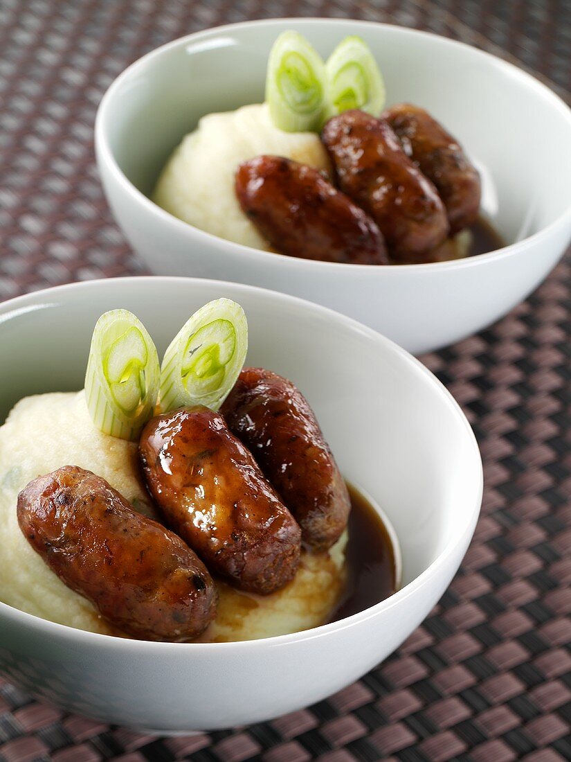 Two Bowls of Bangers and Mash