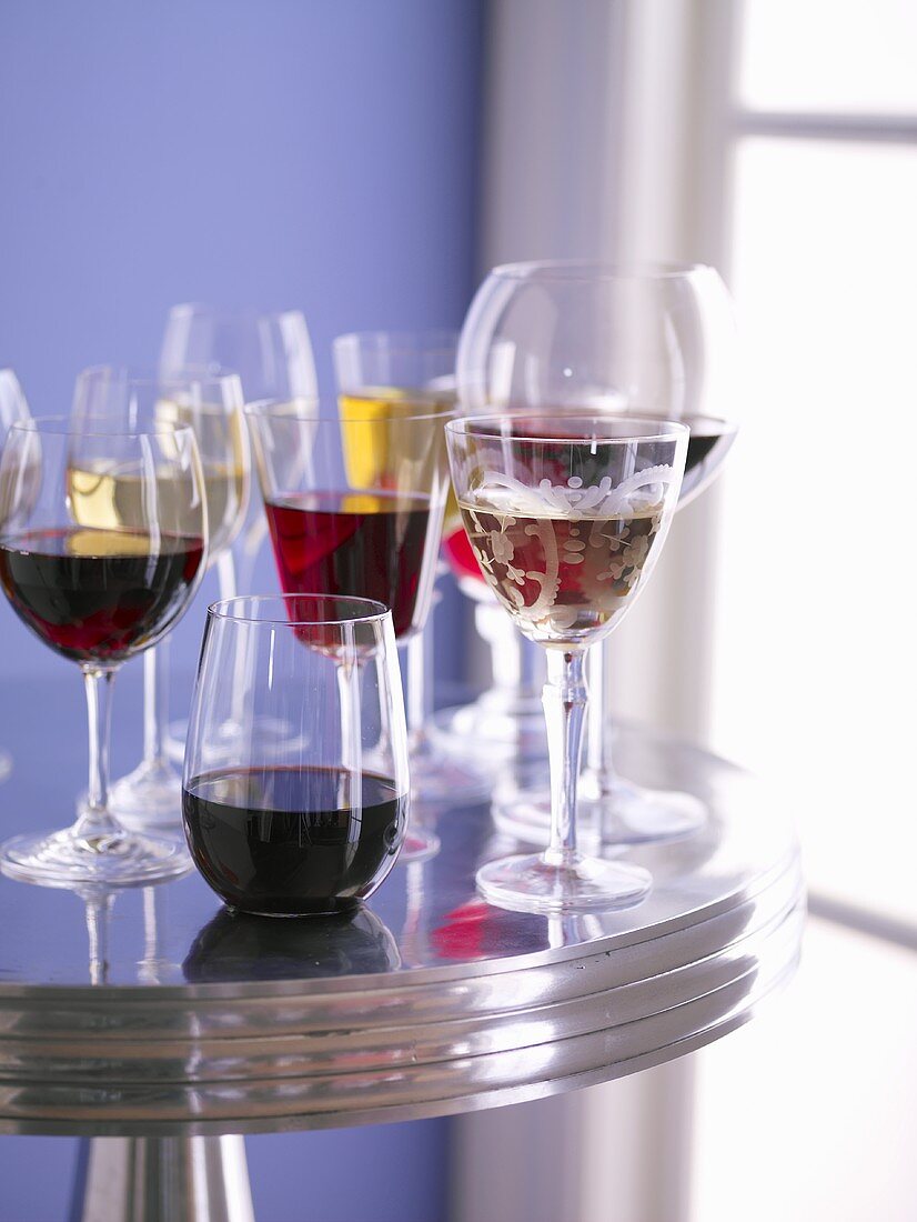 Various Wine Glasses on Metal Table