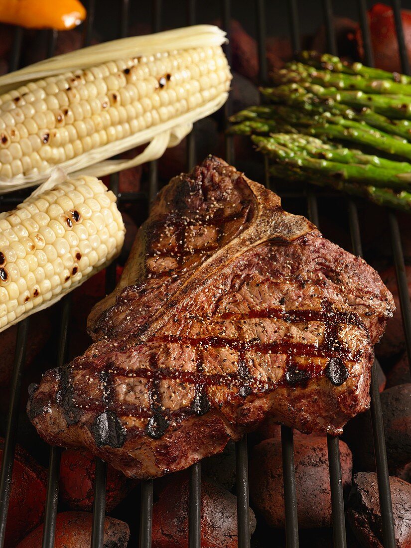 Porterhouse Steak on the Grill with Corn and Asparagus