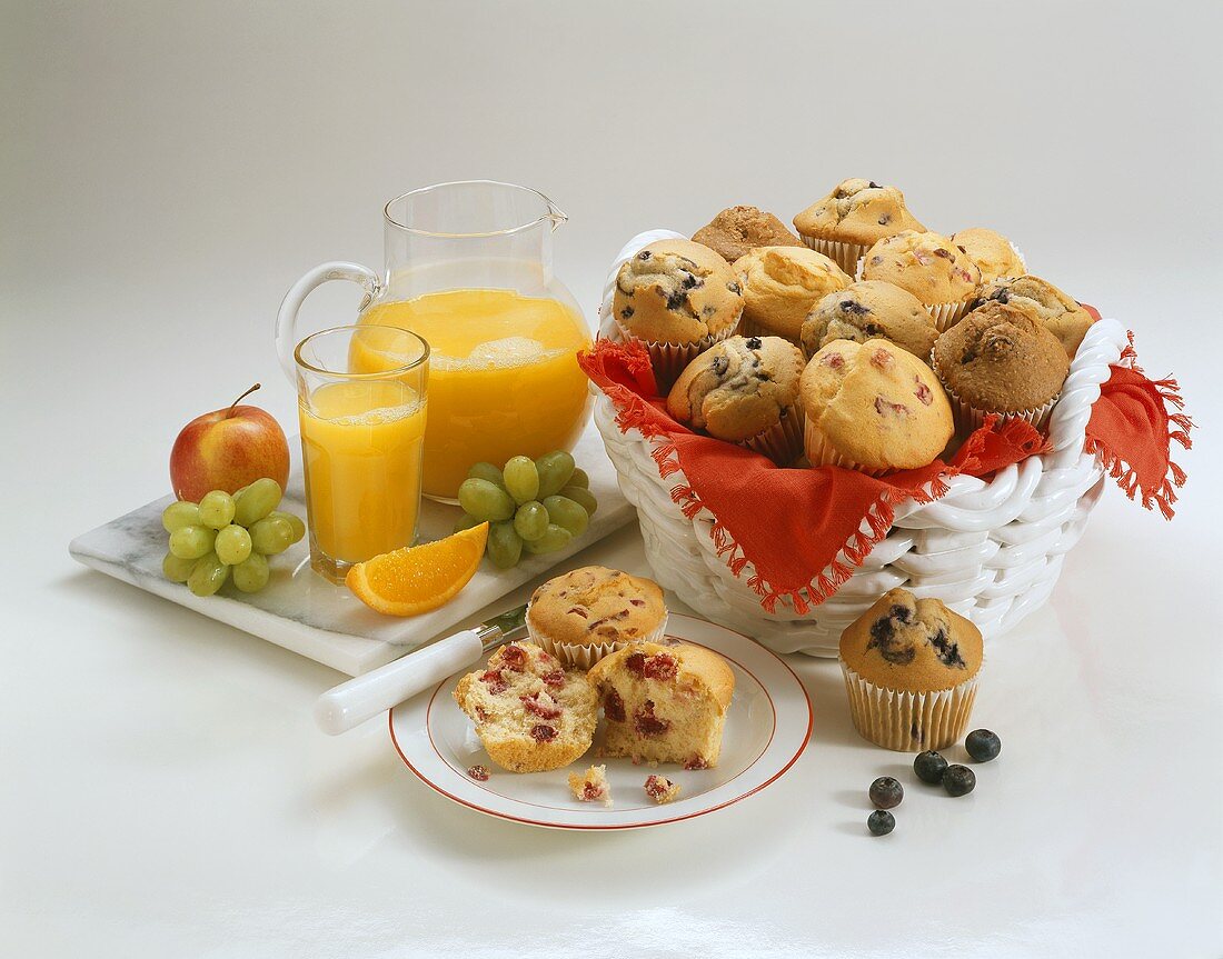 Basket of Assorted Muffins; Orange Juice